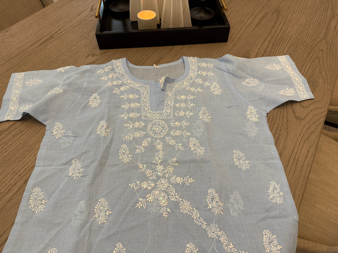 A stylish sea blue Chikankari tunic