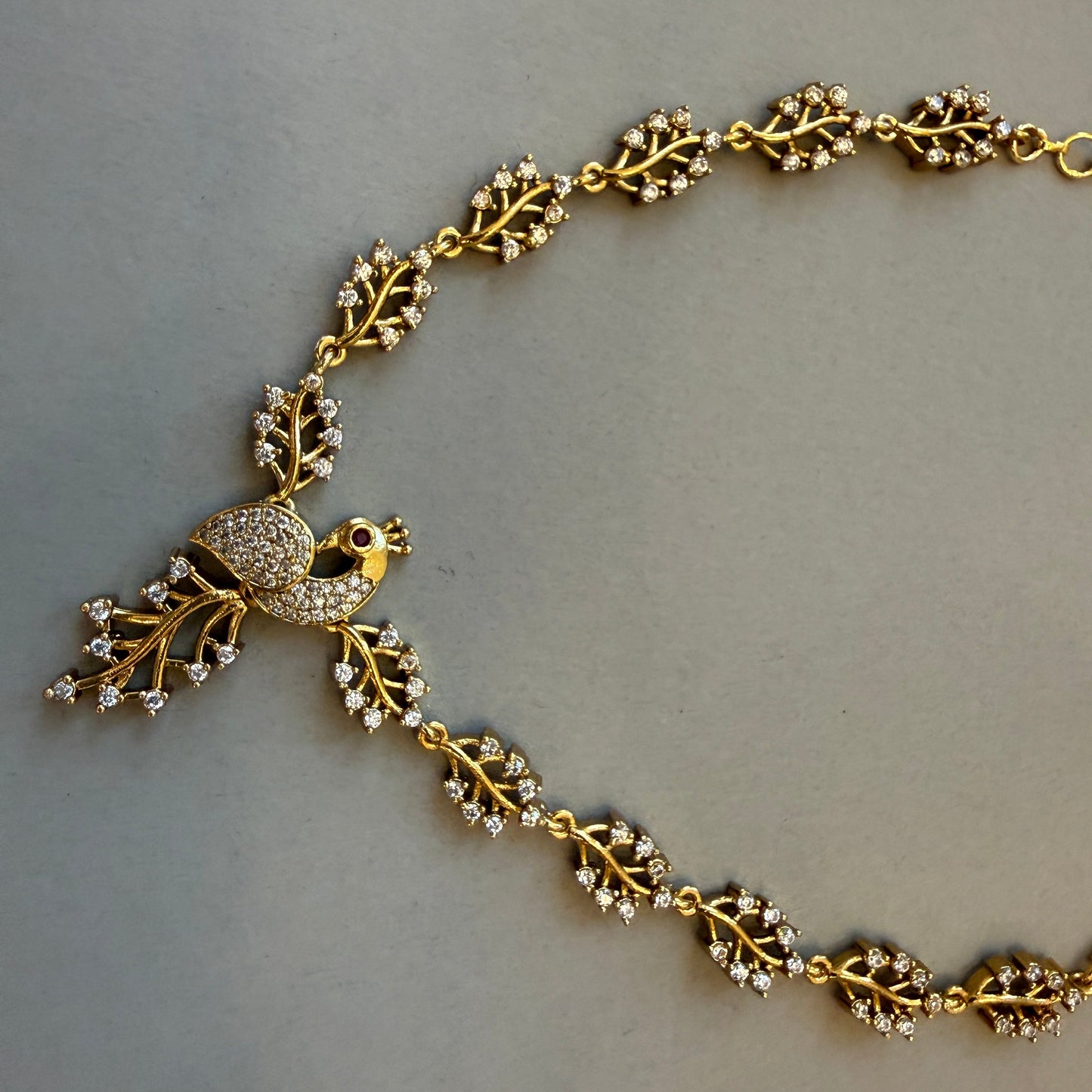 Gracie Gold plated peacock necklace with matching earrings