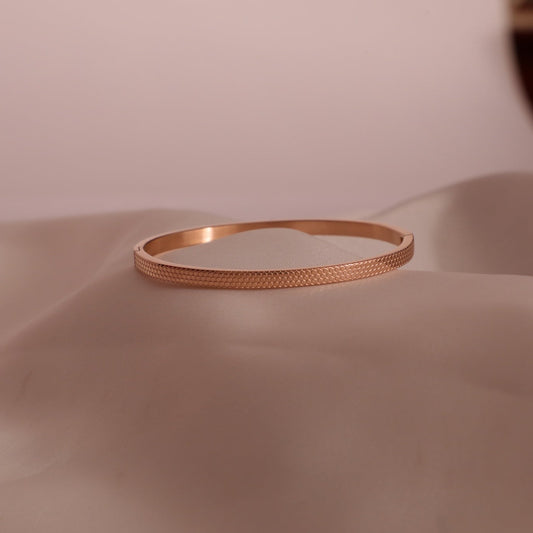 Lena Rose gold tone bangle in honeycomb design
