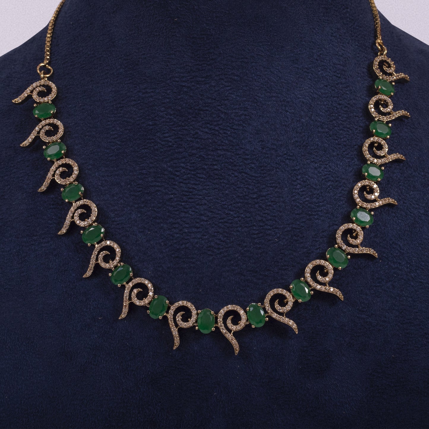 The Emerald Crest Scroll Necklace & Earring Set