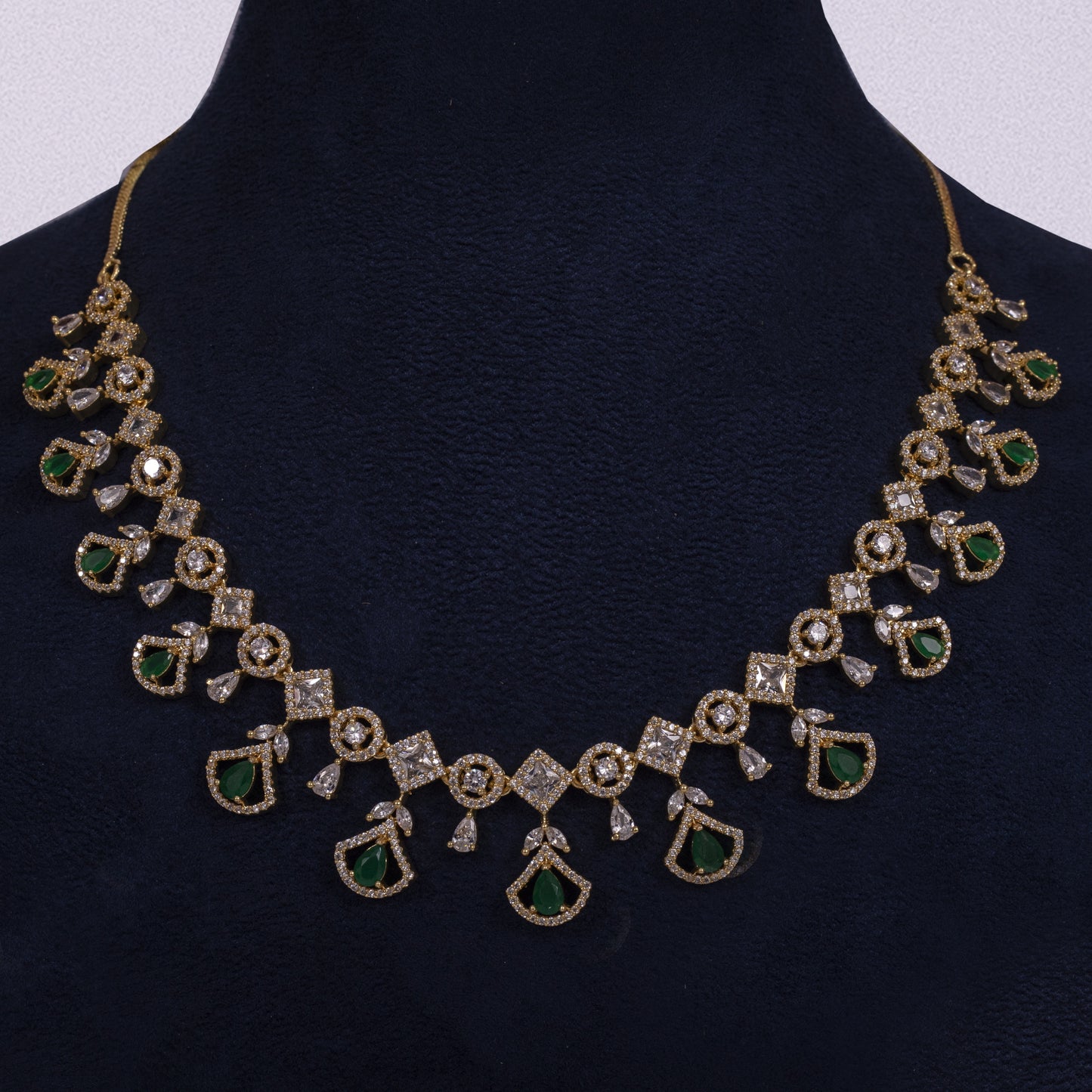 Emerald Radiance: The Golden Filigree Collection