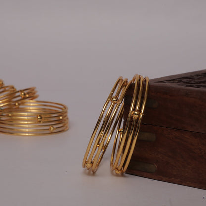 Mona Handcrafted Multi band gold plated bangle