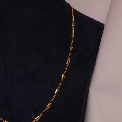 Gold Cylindrical Bead Station Chain