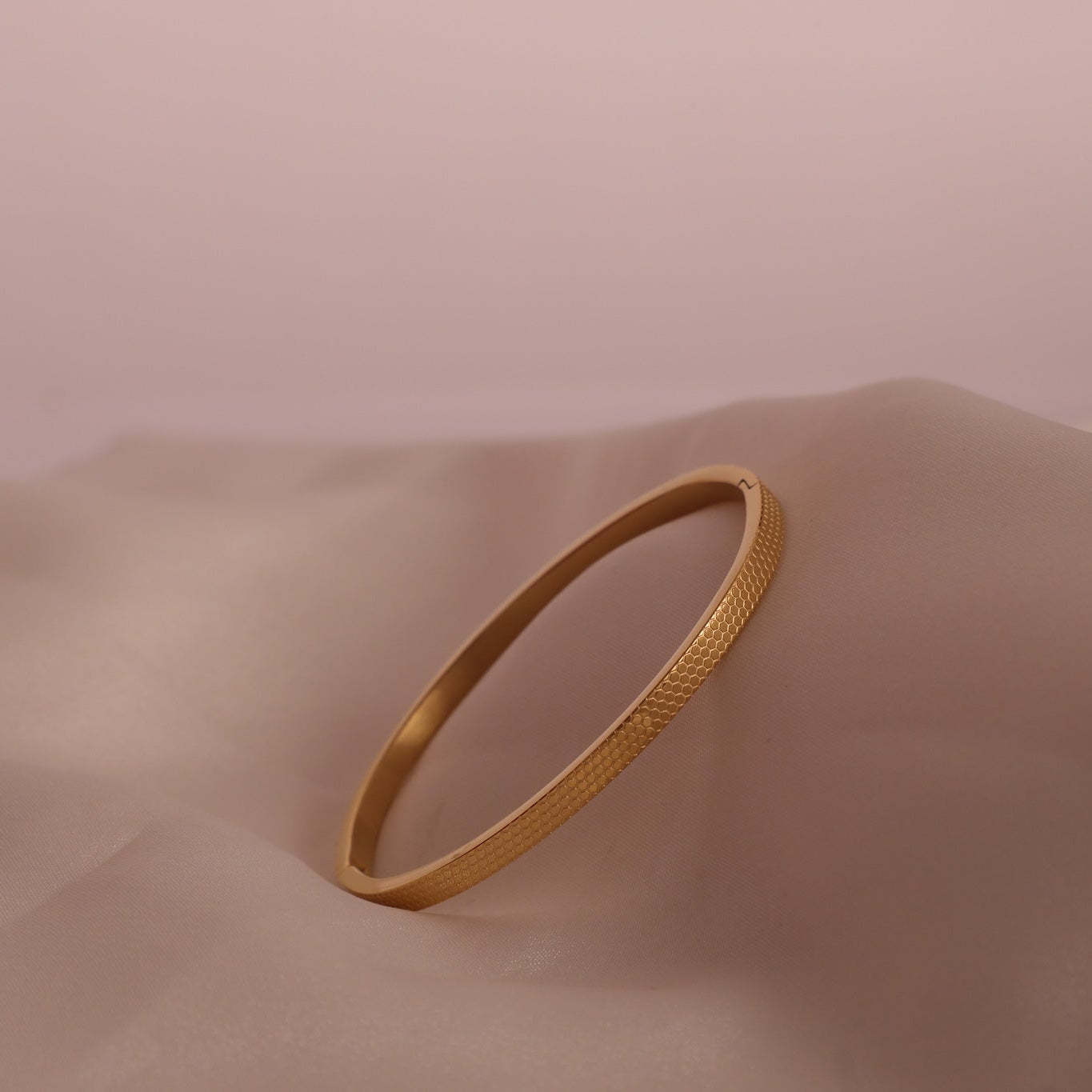 Leena Gold tone Honeycomb Bangle