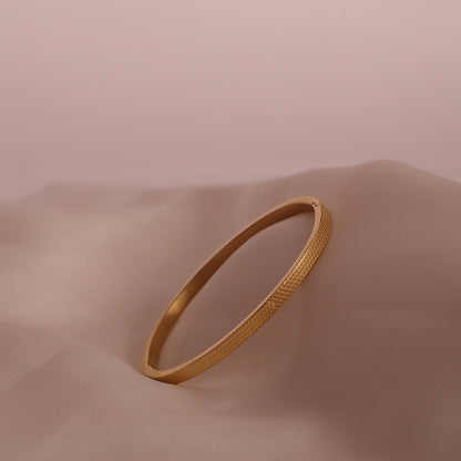 Leena Gold tone Honeycomb Bangle