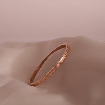 Lena Rose gold tone bangle in honeycomb design