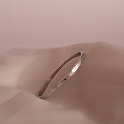 Maya silver toned honeycomb bangle