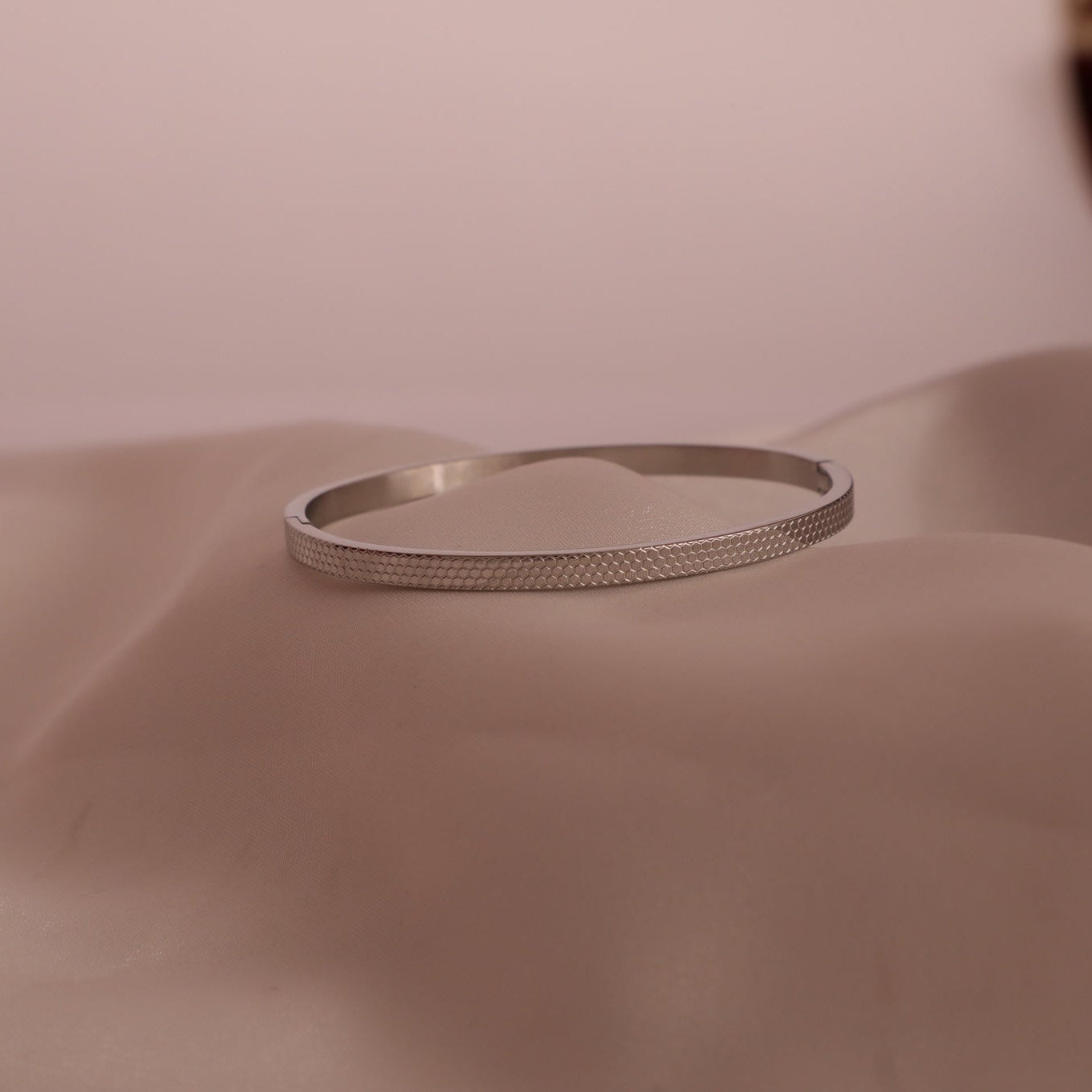 Maya silver toned honeycomb bangle